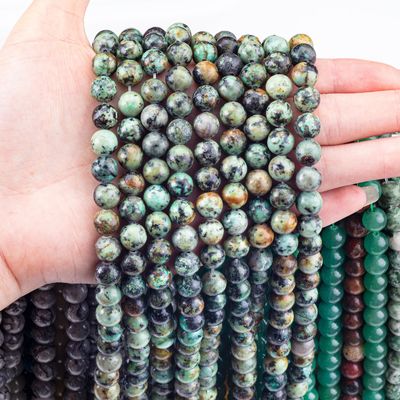 Joalharia feita à mão fazendo pérolas de cristal turquesa africana de 8 mm.