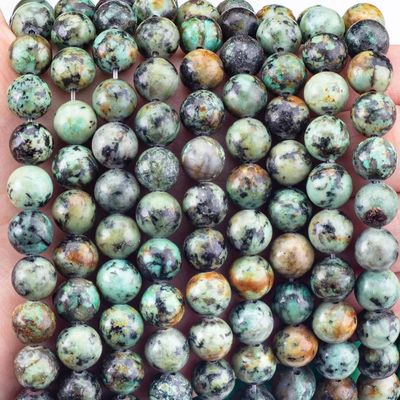 Joalharia feita à mão fazendo pérolas de cristal turquesa africana de 8 mm.