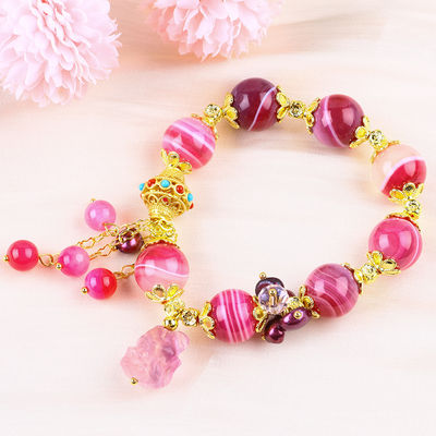 Pulseira de pedra de ágata rosa de 14 mm com escultura de raposa de nove caudas roxa